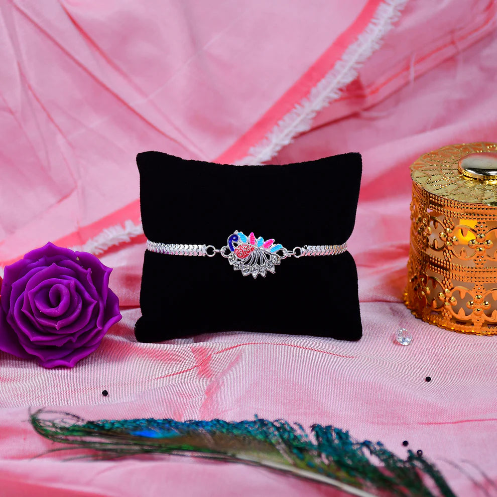 Colorful Peacock Design Rakhi With Enamel Finish And Silver-tone Metal Chain