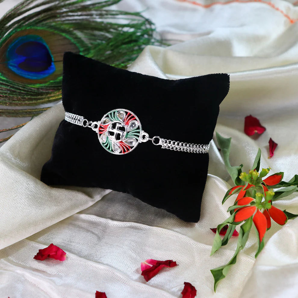 Swastik Design Rakhi With Tricolor Enamel And Silver Metal Chain