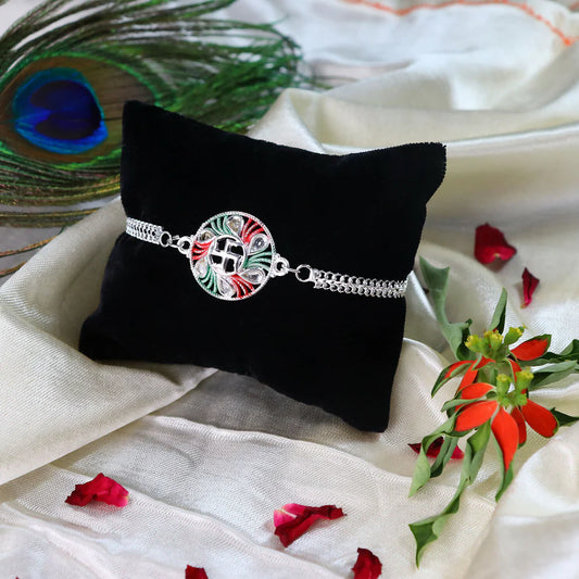 Swastik Design Rakhi With Tricolor Enamel And Silver Metal Chain